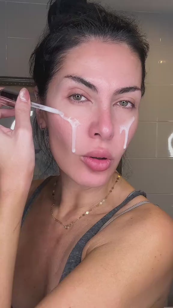 Creator demonstrating serum application